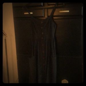 Sleeveless, green maxi dress with front buttons.